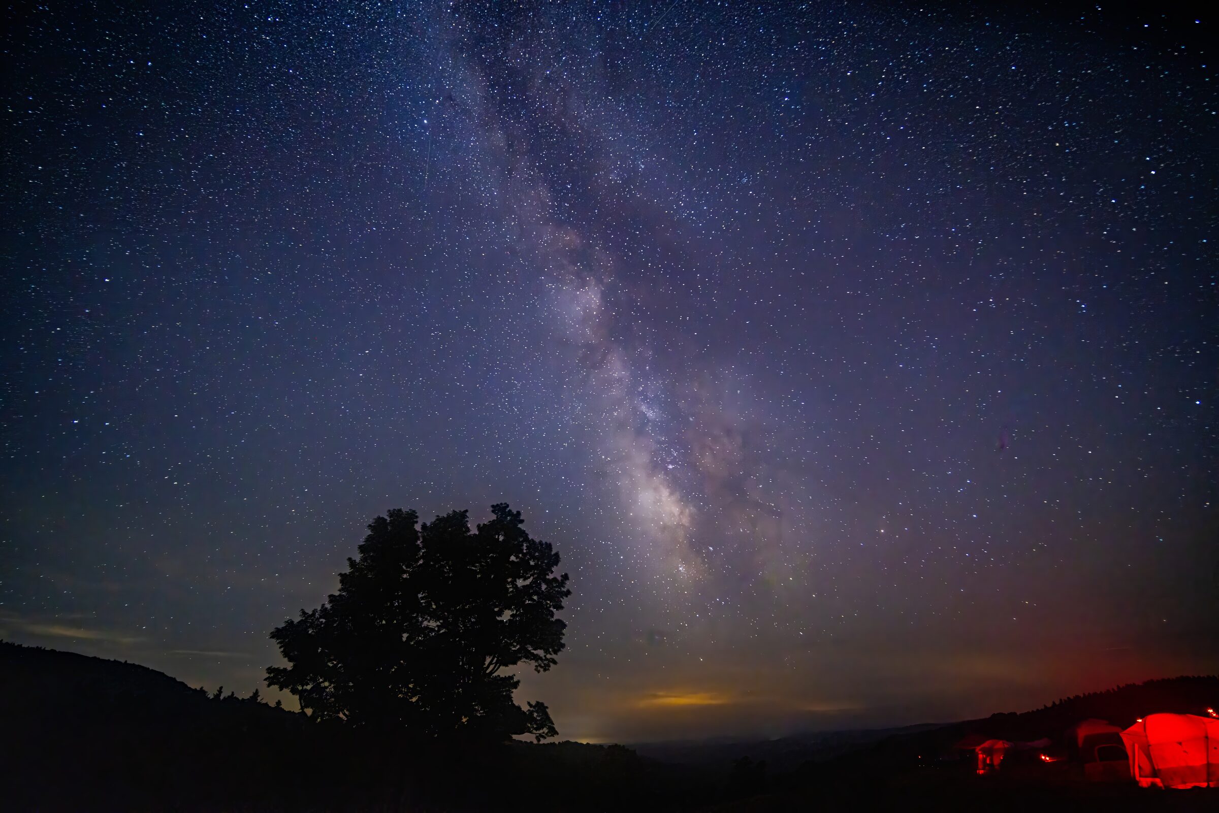 The Milky Way rising over the Almost Heaven Star Party campsite at Spruce Knob Mountain Center